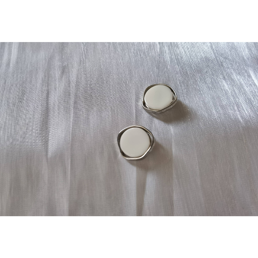 Irregular metal edged glossy buttons