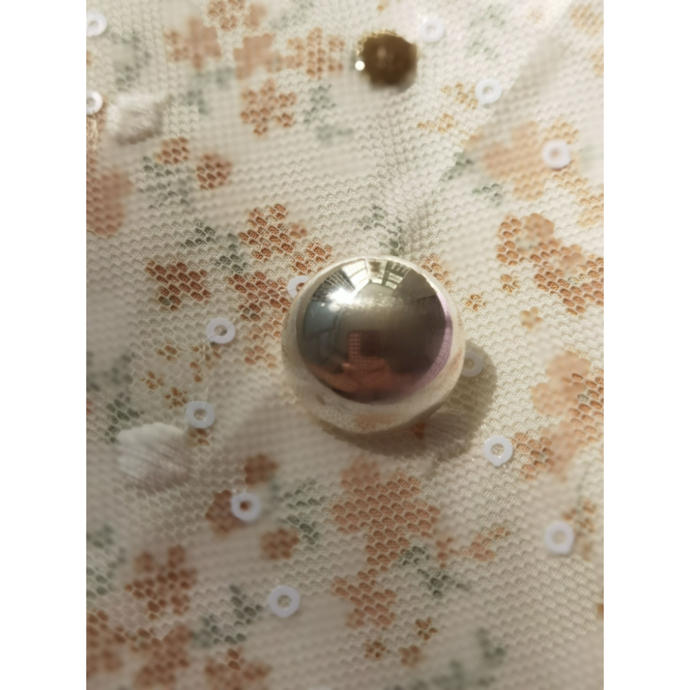 Spherical silver button