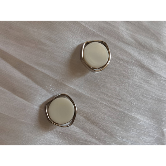 Irregular metal edged glossy buttons