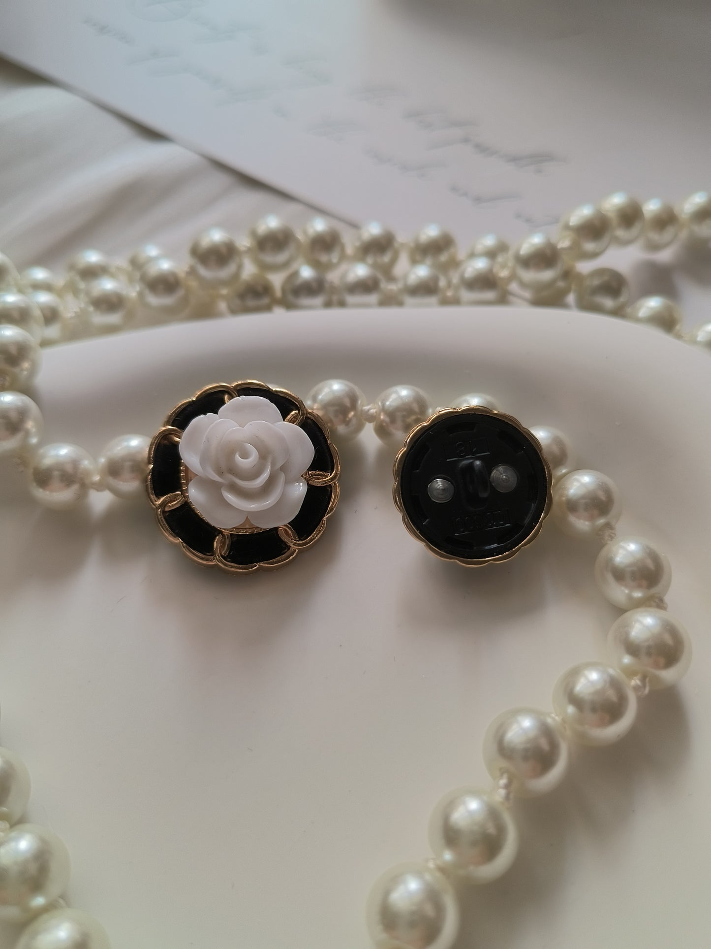 Camellia Premium Button in black and white