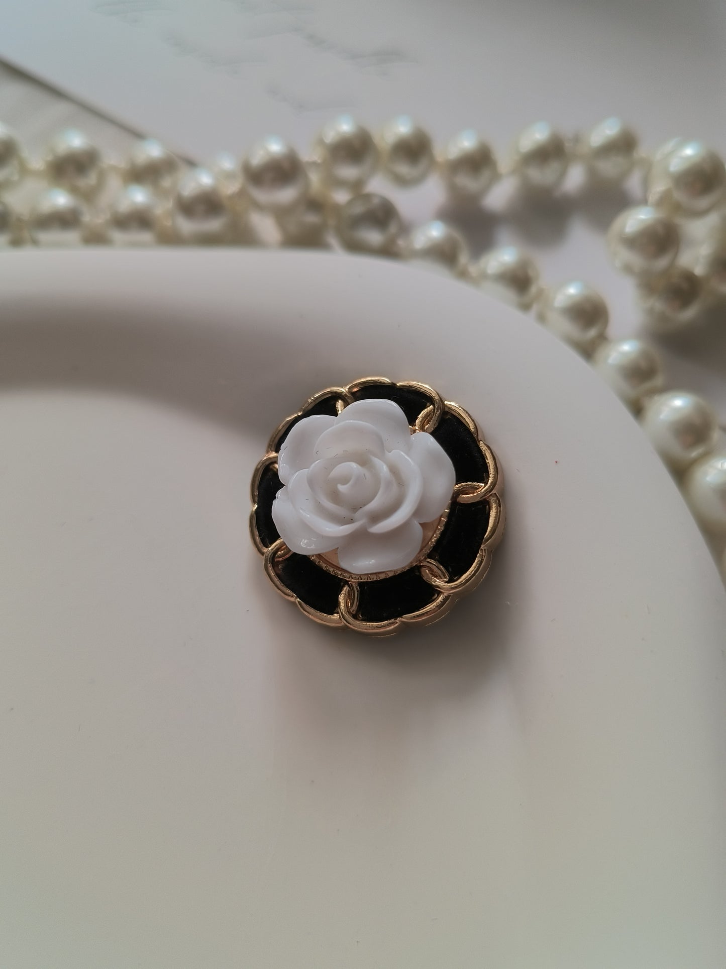 Camellia Premium Button in black and white