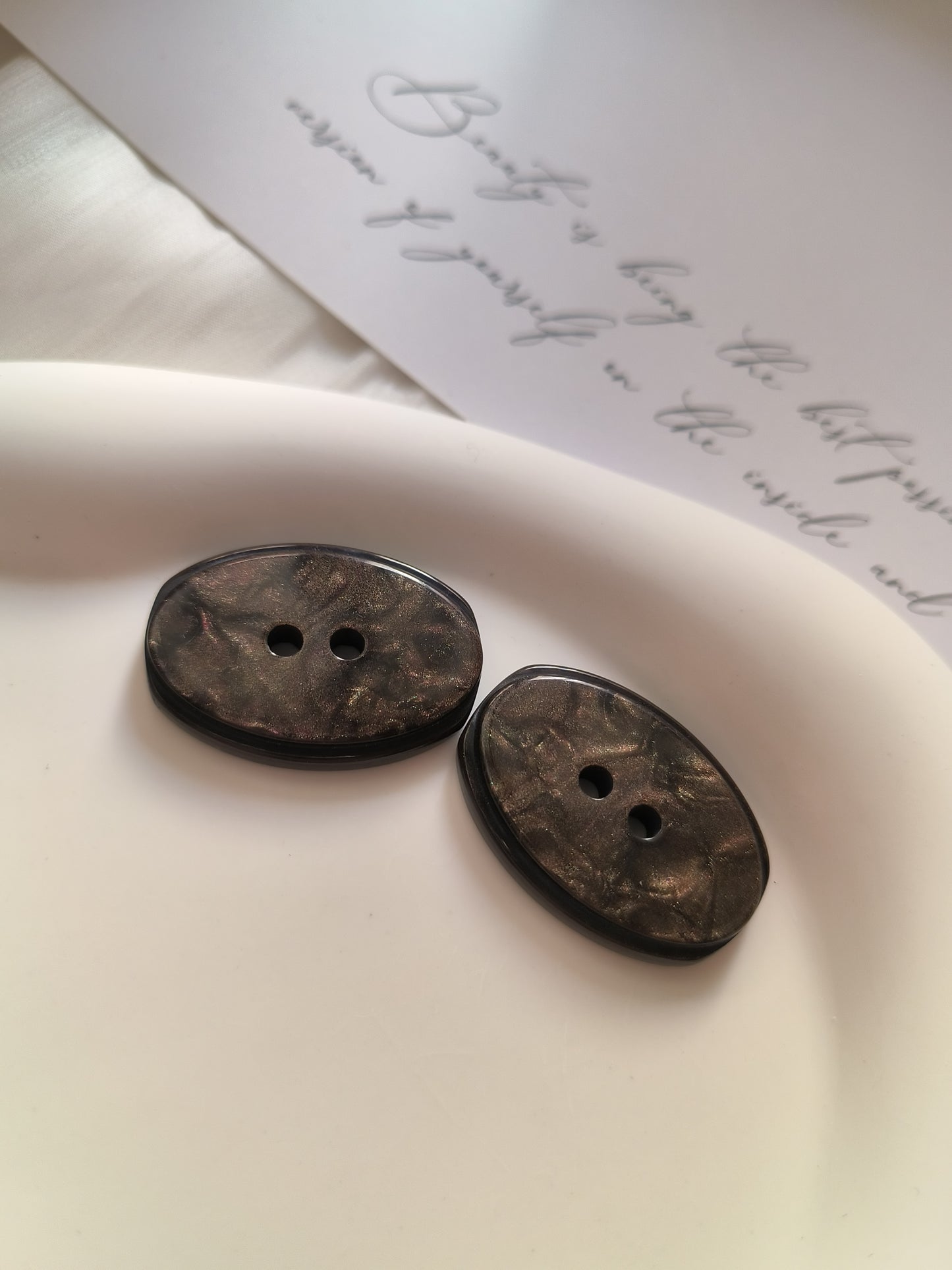 Wood-like oval buttons