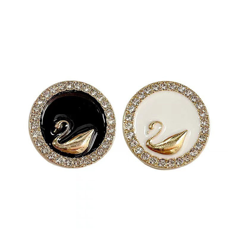 Rhinestone-bound swan buttons