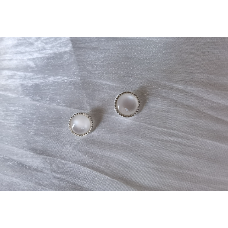 Delicate glossy metal buttons